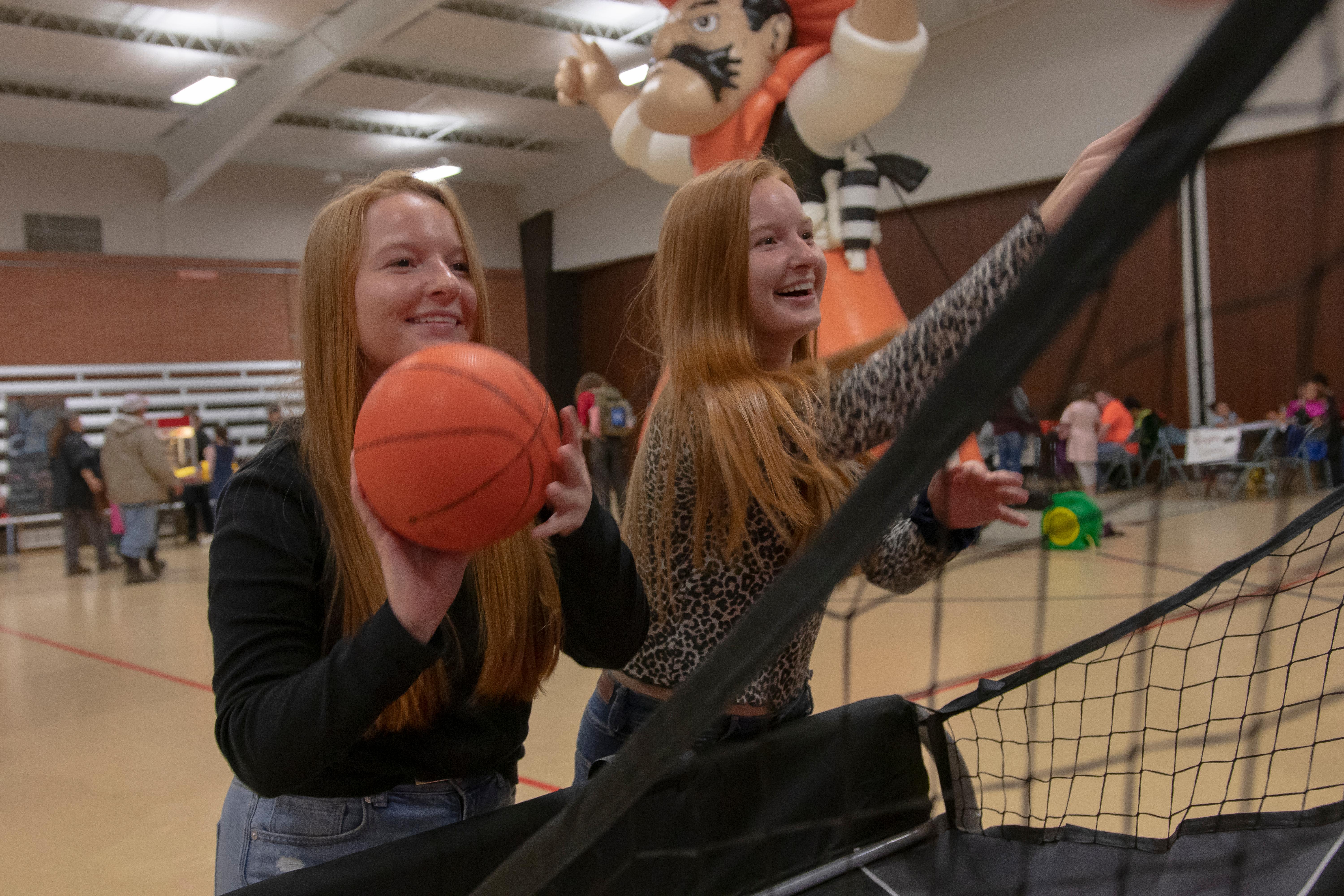 OSUIT Students playing basketball at Carnifall